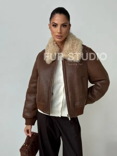 Короткая дубленка - женская - фото 9