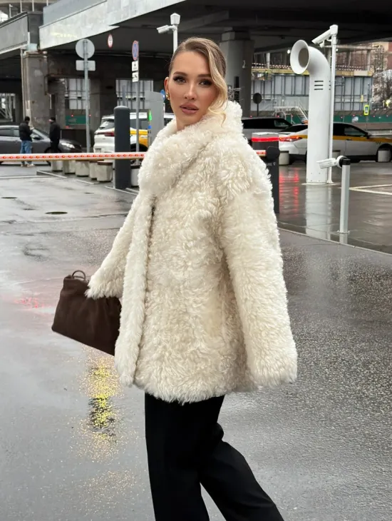 Белая шубка из тиградо - фото 14